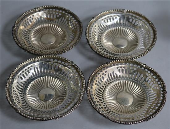 A set of four George V pierced silver bonbon dishes, Goldsmiths & Silversmiths Co Ltd, London, 1916, 12.7cm, 16.5 oz.
